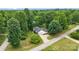 Aerial view of a home surrounded by lush greenery at 1004 Gracebrook Dr, Salisbury, NC 28147