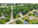 Aerial view of a home nestled among lush trees in a peaceful neighborhood at 1004 Gracebrook Dr, Salisbury, NC 28147