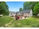 Expansive backyard featuring a patio, and plenty of green space for recreation and outdoor activities at 1004 Gracebrook Dr, Salisbury, NC 28147