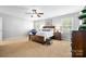 Bright bedroom with two large windows, plush carpet, neutral paint, and plenty of space at 1004 Gracebrook Dr, Salisbury, NC 28147