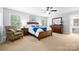 Spacious bedroom with plush carpet, natural light, and traditional furnishings at 1004 Gracebrook Dr, Salisbury, NC 28147