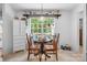 Cozy breakfast nook with a view of the backyard is perfect for enjoying your morning coffee at 1004 Gracebrook Dr, Salisbury, NC 28147