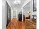 Elegant entryway with hardwood floors, decorative lighting, and a view into the living spaces at 1004 Gracebrook Dr, Salisbury, NC 28147