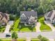 Aerial view of the home, showcasing its landscaped yard and neighborhood at 1008 Ladera Dr, Waxhaw, NC 28173