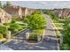 Neighborhood street view showcases manicured lawns and beautiful brick homes at 1008 Ladera Dr, Waxhaw, NC 28173