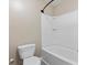 Bathroom featuring a modern toilet and tiled shower over tub at 112 Artisan Ct, Mooresville, NC 28117