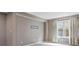 Neutral bedroom with beige carpeting and curtains over the windows at 112 Artisan Ct, Mooresville, NC 28117