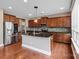 Gourmet kitchen featuring stainless steel appliances and a center island at 112 Artisan Ct, Mooresville, NC 28117