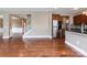 Modern kitchen with stainless steel appliances and hardwood floors at 112 Artisan Ct, Mooresville, NC 28117