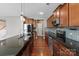 Modern kitchen with stainless steel appliances and granite countertops at 112 Artisan Ct, Mooresville, NC 28117