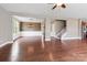 Open living space featuring hardwood floors, stylish lighting, and an open floor plan at 112 Artisan Ct, Mooresville, NC 28117