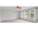 Spacious main bedroom with a ceiling fan and lots of natural light at 112 Artisan Ct, Mooresville, NC 28117