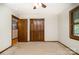 Bedroom has an adjacent closet and window with wooden shutters at 1142 Foxberry Rd, Lincolnton, NC 28092