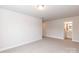 Spacious carpeted bedroom leading to an en-suite bathroom, offering a comfortable layout at 115 Kerr Walk Dr # 37, Statesville, NC 28677