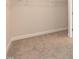 Walk-in closet features carpeted floor and wire shelving for ample storage space at 115 Kerr Walk Dr # 37, Statesville, NC 28677