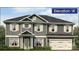Charming two-story home with gray siding, white trim, and a two-car garage at 115 Kerr Walk Dr # 37, Statesville, NC 28677