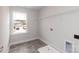 Functional laundry room with a window, tile floor, and space for a utility sink at 115 Kerr Walk Dr # 37, Statesville, NC 28677
