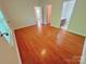 Bedroom featuring hardwood floors, neutral paint and ample natural light at 11624 Truan Ln, Cornelius, NC 28031