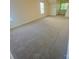 Expansive bonus room with neutral carpet, with natural lighting from windows offering versatility at 11624 Truan Ln, Cornelius, NC 28031