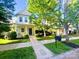Charming two-story home with a welcoming front porch and mature landscaping at 11624 Truan Ln, Cornelius, NC 28031