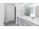 Modern bathroom featuring double sink vanity with gray cabinets, a large mirror, and a separate shower with glass door at 118 Kerr Walk Dr # 17, Statesville, NC 28677