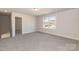 Spacious, carpeted bonus room with natural light at 118 Kerr Walk Dr # 17, Statesville, NC 28677