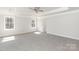 Large main bedroom with tray ceiling and windows at 118 Kerr Walk Dr # 17, Statesville, NC 28677