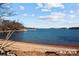 Scenic lake view with boat docks, showcasing peaceful waterfront scenery at 14515 Nc Hwy 73 Hwy, Huntersville, NC 28078
