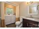 Bathroom includes washer, dryer, and modern fixtures at 1506 Cameron Dr, Statesville, NC 28625