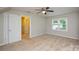 Bedroom with neutral carpet, ceiling fan and natural light from a window at 1506 Cameron Dr, Statesville, NC 28625