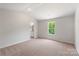 Bright bedroom featuring a large window that offers natural light and outdoor views, perfect for a serene living space at 1508 Doran Ter, Richburg, SC 29729