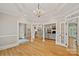 Spacious living room with hardwood floors and elegant architectural details at 17308 Players Ridge Dr, Cornelius, NC 28031