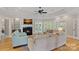 Comfortable living room with fireplace, hardwood floors, and neutral decor at 17308 Players Ridge Dr, Cornelius, NC 28031
