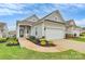 Charming single-story home featuring an attached garage and welcoming landscaped front yard at 17436 Hawks View Dr, Indian Land, SC 29707