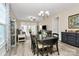 Bright living space with dining and living room, showcasing a neutral color palette and light wood floors at 17436 Hawks View Dr, Indian Land, SC 29707