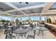 Spacious outdoor seating area with ceiling fans, perfect for relaxing and socializing in a comfortable environment at 17436 Hawks View Dr, Indian Land, SC 29707