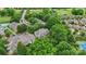 A serene aerial view of townhomes surrounded by trees and lush greenery in a residential area at 18840 Silver Quay Dr # 12, Cornelius, NC 28031
