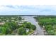 Scenic aerial view showcasing waterfront community, lake access, and lush landscaping at 18840 Silver Quay Dr # 12, Cornelius, NC 28031