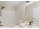 Bathroom featuring a shower-tub combo, a white vanity, a mirror, and neutral walls at 18840 Silver Quay Dr # 12, Cornelius, NC 28031