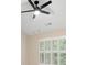 Bedroom with shutters on the windows and a ceiling fan at 18840 Silver Quay Dr # 12, Cornelius, NC 28031