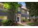 Charming gray two-story home featuring manicured landscaping, a welcoming entrance, and well-maintained siding at 18840 Silver Quay Dr # 12, Cornelius, NC 28031