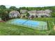 A pristine tennis court is centrally located amongst well-maintained townhome residences at 18840 Silver Quay Dr # 12, Cornelius, NC 28031