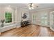 Spacious living room with hardwood floors, natural light, and stylish decor adding to its charm at 2006 Sandy Pond Ln, Waxhaw, NC 28173