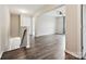 Open floor plan featuring hardwood floors, staircase and an adjacent room at 2017 New Hope Branch Way, Belmont, NC 28012