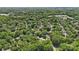 An aerial view showcases houses nestled among verdant trees in a peaceful neighborhood at 2234 Hamilton Mill Rd, Charlotte, NC 28270
