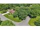 Aerial view of a beautiful home surrounded by lush greenery and meticulously maintained landscaping at 2234 Hamilton Mill Rd, Charlotte, NC 28270