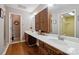 Bathroom with double vanity and tile floors, plus separate room with toilet and shower at 2234 Hamilton Mill Rd, Charlotte, NC 28270