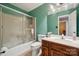 Bathroom features a shower with swan etched doors, a toilet, and vanity with traditional fixtures at 2234 Hamilton Mill Rd, Charlotte, NC 28270