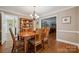 Inviting dining room with hardwood floors and a view to living room, perfect for Gathering gatherings at 2234 Hamilton Mill Rd, Charlotte, NC 28270