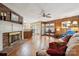 Spacious living room with fireplace, wood paneling, and modern flooring, blending comfort and style at 2234 Hamilton Mill Rd, Charlotte, NC 28270